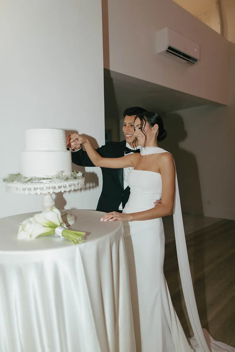 Cake cutting at a Moments on Main wedding reception, Payson