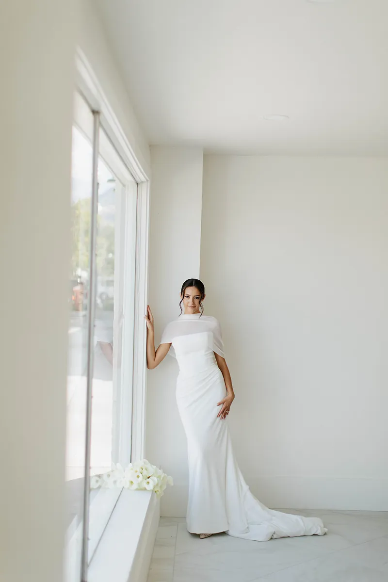 Bride by the front windows at Moments on Main, Payson