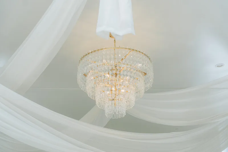Chandelier and draping in the main room at Moments on Main, Payson