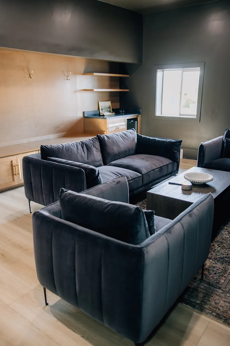 Groom's lounge seating at Moments on Main, Payson