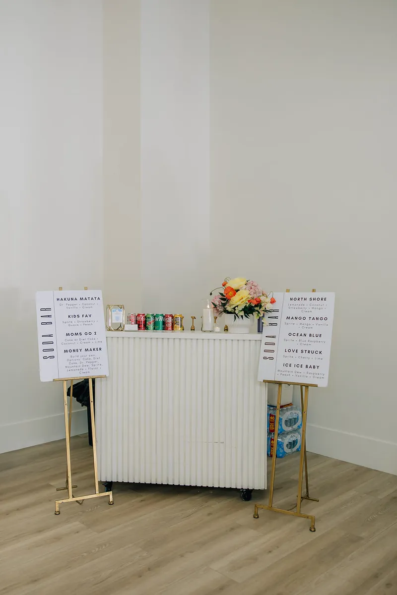 Soda bar cart with menu boards at Moments on Main, Payson